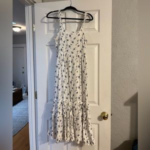 Gorgeous white ruffled maxi dress with tiny blue florals